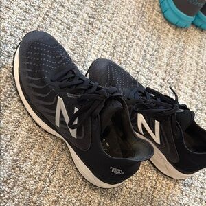 New Balance Black and White Athletic Shoes with Cushioned Comfort